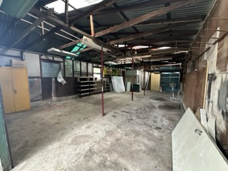 Double garage space with storage shelves