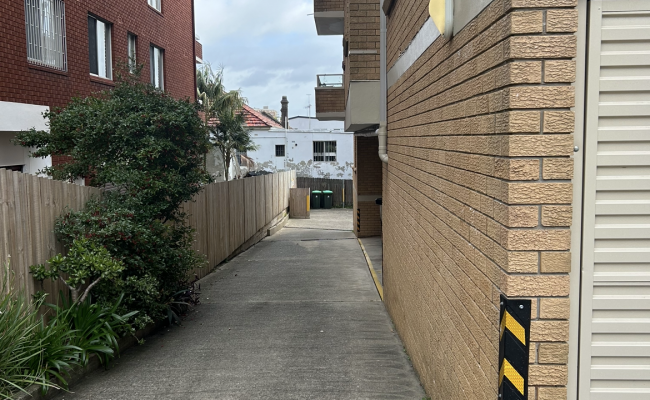 Secure, covered parking space 10-minute walk from beach