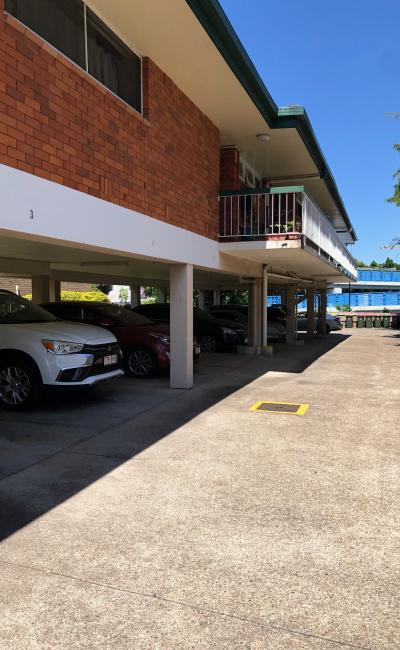 Covered private spot. Only 5 min walk to Buranda train/bus station and 8 min to PA Hospital