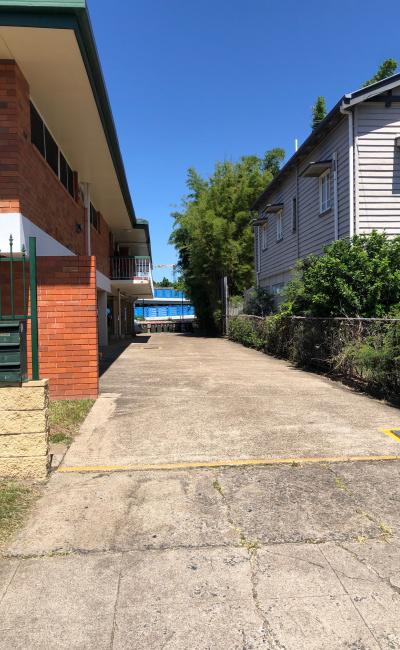 Covered private spot. Only 5 min walk to Buranda train/bus station and 8 min to PA Hospital