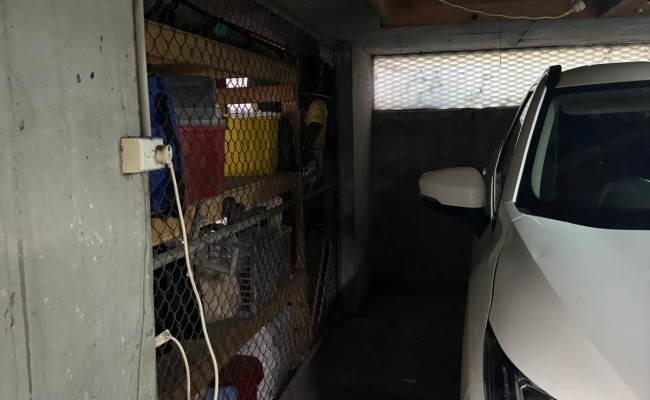 Secure, easy access, garage space with electric remote