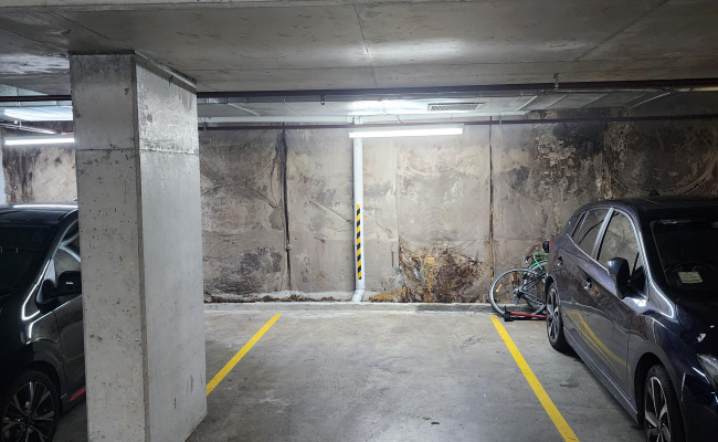 Great indoor covered secured parking space near Mascot station and the airport