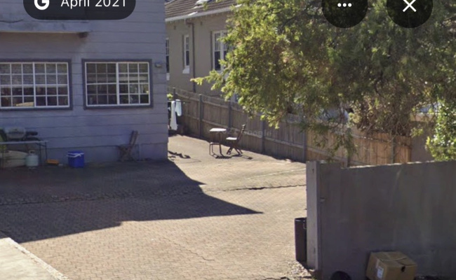 Great parking space beside bus stop into the city!