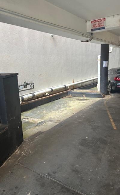 Front row / first spot under the building next to shops and 30 second walk to beach.