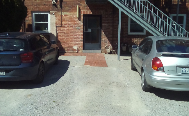 Outdoor lot parking on Grey Street in East Melbourne