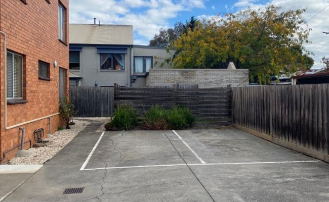 Safe, simple car space within property