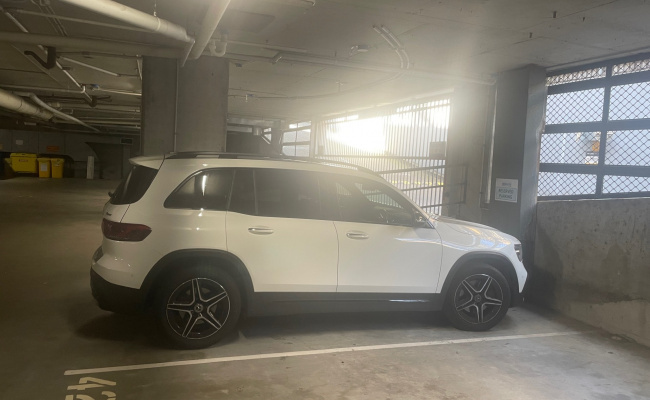 Secure underground car park in commercial building, close to transport and shopping