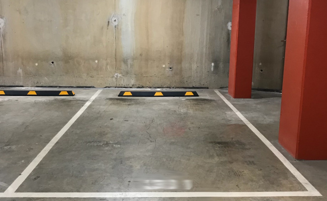 Secure under cover car space in Ivory Building