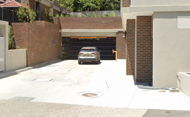 Secure parking space two minutes from Petersham Station