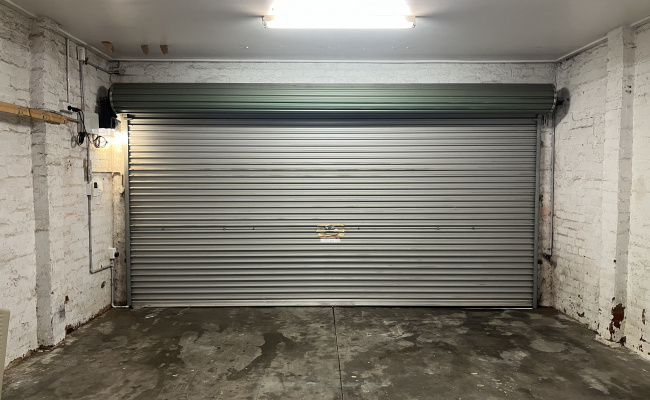 You're booking RIGHT SIDE - easy, secure garage near Smith & Gertrude St. Fits 2 cars