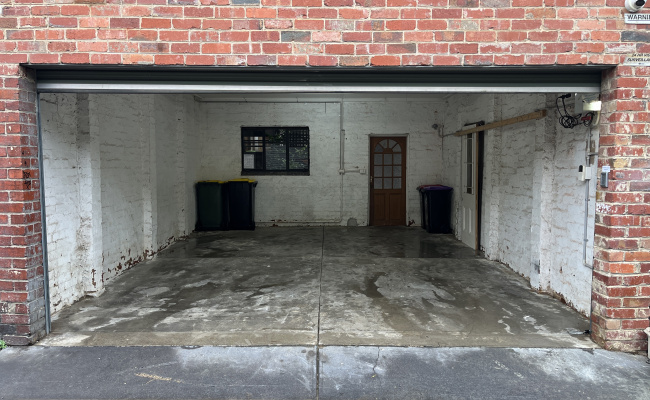 You're booking RIGHT SIDE - easy, secure garage near Smith & Gertrude St. Fits 2 cars